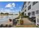 Waterfront patio with comfortable seating areas and stunning views of the harbor, ideal for outdoor relaxation at 5960 30Th S Ave # 414, Gulfport, FL 33707