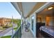 Spacious outdoor balcony with seating area, providing views of the surrounding neighborhood at 6822 Kissimmee St # 8-B, Tampa, FL 33616