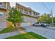 Spacious townhome featuring a multi-car garage and large covered porch at 6822 Kissimmee St # 8-B, Tampa, FL 33616