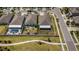 An aerial view of the house, highlighting its location in a neighborhood at 7202 Ozello Trail Ave, Ruskin, FL 33573