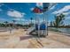 Community splash pad featuring a water bucket, slide, and kid-friendly features, perfect for cooling off on warm days at 7202 Ozello Trail Ave, Ruskin, FL 33573