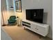 Comfortable living room area with contemporary furniture and modern lighting fixture at 7208 N Glen Ave, Tampa, FL 33614