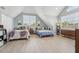 Spacious bedroom with lots of natural light, two beds, and stylish decor and light-colored flooring at 750 Sand Pine Ne Dr, St Petersburg, FL 33703