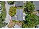 Aerial view of property showcasing the home's layout, yard, and surrounding neighborhood at 7714 Bayleaf Dr, Hudson, FL 34667