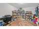 Organized storage area features shelving units filled with various items at 7714 Bayleaf Dr, Hudson, FL 34667