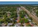 Aerial view of the property showing proximity to highway and neighborhood at 785 Hickory Ln, Palm Harbor, FL 34683