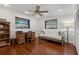 Office featuring hardwood floors, a ceiling fan, and an abundance of natural light at 785 Hickory Ln, Palm Harbor, FL 34683