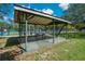 Enjoy the outdoors under this picnic shelter, featuring a wooden picnic table, ideal for gatherings and relaxation at 785 Hickory Ln, Palm Harbor, FL 34683