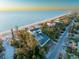 Stunning beach house aerial view on the Gulf Coast with water views at 8030 Manasota Key Rd, Englewood, FL 34223