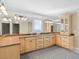Bathroom featuring dual sinks, lots of counterspace, and great lighting at 8030 Manasota Key Rd, Englewood, FL 34223