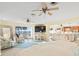 Bright living room with ceiling fans and beautiful ocean views at 8030 Manasota Key Rd, Englewood, FL 34223