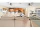 Open-concept living room with a seamless transition to the kitchen and dining area, perfect for entertaining at 8030 Manasota Key Rd, Englewood, FL 34223