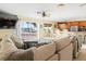 Spacious open living area with views of the beach and pool at 8030 Manasota Key Rd, Englewood, FL 34223