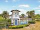 Community entrance and welcome sign featuring lush landscaping and an inviting blue and white color scheme at 10742 Verawood Dr, Riverview, FL 33579