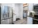 Spacious kitchen featuring stainless steel appliances and granite countertops at 10742 Verawood Dr, Riverview, FL 33579