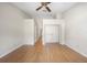 Spacious bedroom with wood flooring, ceiling fan, and closet at 11357 Stratton Park Dr # 11357, Temple Terrace, FL 33617
