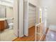 Hallway featuring access to a bathroom with a shower/tub combo at 11357 Stratton Park Dr # 11357, Temple Terrace, FL 33617