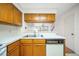 Kitchen view with a view to the living room and bright white countertops at 11357 Stratton Park Dr # 11357, Temple Terrace, FL 33617