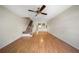 Spacious living area with hardwood floors and stairs leading to the second floor at 11357 Stratton Park Dr # 11357, Temple Terrace, FL 33617