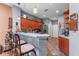 Well-lit kitchen features updated appliances, a breakfast bar, and ample cabinet space at 11466 Captiva Kay Dr, Riverview, FL 33569