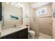 Bathroom featuring single vanity with a large shower, and a modern toilet at 11506 Harbourside Ln, Parrish, FL 34219