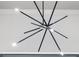 Modern chandelier with star-like design at 11506 Harbourside Ln, Parrish, FL 34219