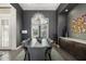Elegant dining room with modern light fixture and stylish decor at 11506 Harbourside Ln, Parrish, FL 34219