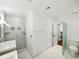 Bathroom features a shower, toilet, and single sink vanity at 13004 Bell Creek Chase, Riverview, FL 33569