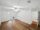 Bedroom features light hardwood floors, closet, and a doorway at 13004 Bell Creek Chase, Riverview, FL 33569
