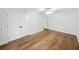 Bedroom features hardwood floors and a closet with double doors at 13004 Bell Creek Chase, Riverview, FL 33569