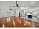 Bright, open living space with seamless flow between living room and kitchen with modern finishes at 13004 Bell Creek Chase, Riverview, FL 33569