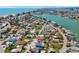 Expansive aerial view showcasing the beautiful residential area with coastal scenery at 13117 4Th E St, Madeira Beach, FL 33708