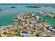 Gorgeous aerial shot of coastal home with beautiful water views and neighborhood at 13117 4Th E St, Madeira Beach, FL 33708