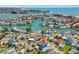 Aerial view of waterfront community showing the home's prime location and surrounding waterways at 13117 4Th E St, Madeira Beach, FL 33708
