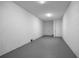 Spacious unfinished basement area with concrete walls and flooring, ready to be customized at 13117 4Th E St, Madeira Beach, FL 33708