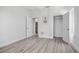 Empty bedroom showing hardwood floors, closet, and adjacent bath at 13117 4Th E St, Madeira Beach, FL 33708