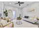 Comfortable living room featuring a neutral color palette, stylish furniture, and a serene atmosphere at 13117 4Th E St, Madeira Beach, FL 33708