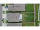 Aerial view of backyard with patio area featuring outdoor furniture and privacy fence at 15718 Fort Island Pl, Sun City Center, FL 33573