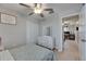 This bedroom has light wood floors and a large closet for extra storage at 15718 Fort Island Pl, Sun City Center, FL 33573