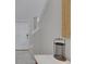 Entryway with tile flooring, white door, and decorative lantern on a marble-top table at 15718 Fort Island Pl, Sun City Center, FL 33573