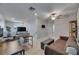 Upstairs living area with a desk, television, and comfortable seating at 15718 Fort Island Pl, Sun City Center, FL 33573