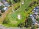 Beautiful shot of a golf course with homes nearby, highlighting the community's allure at 16169 Gardendale Dr, Tampa, FL 33624