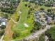 Golf course aerial view showcasing homes in the neighborhood, emphasizing the prime location at 16169 Gardendale Dr, Tampa, FL 33624