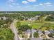 Expansive aerial view of the neighborhood, revealing the home's desirable location near golf course at 16169 Gardendale Dr, Tampa, FL 33624