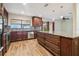 Modern kitchen with stainless steel appliances, granite countertops, and island at 16169 Gardendale Dr, Tampa, FL 33624