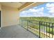 Relaxing balcony view overlooking the waterway with a walking path along the river at 1695 Pinellas Bayway S # E6, St Petersburg, FL 33715