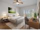 Cozy bedroom with a desk, lots of light and a comfortable work-from-home area at 1695 Pinellas Bayway S # E6, St Petersburg, FL 33715