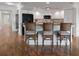 Kitchen with granite counters, breakfast bar, and modern appliances, perfect for entertaining at 1695 Pinellas Bayway S # E6, St Petersburg, FL 33715