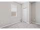 Bedroom with a bright window and a closet at 18837 Litzau Ln, Land O Lakes, FL 34638