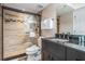Modern bathroom featuring a walk-in shower with stylish tile work at 19418 Gulf Blvd # 507, Indian Shores, FL 33785